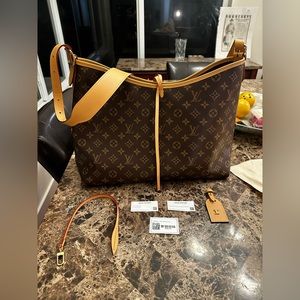 Louis Vuitton carry all messenger bag